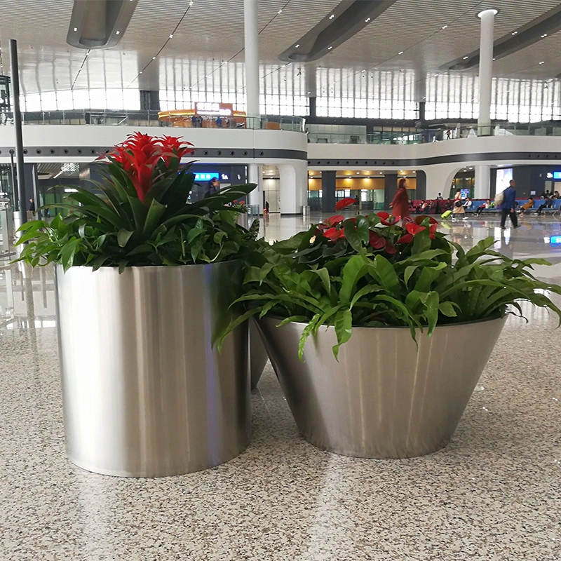 Stainless Steel Flowerpot Secret: Year-Round Plant Survival!